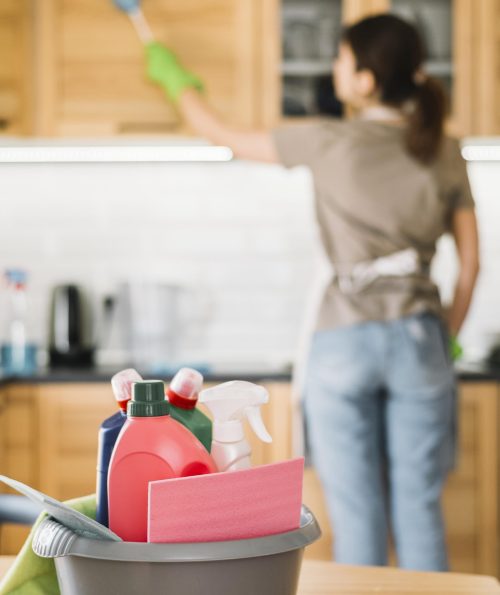 blurred-woman-using-fluffy-duster
